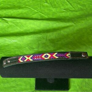 Handmade woven leather bracelet with snap closure